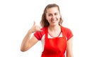 Female hypermarket or supermarket employee making call gesture